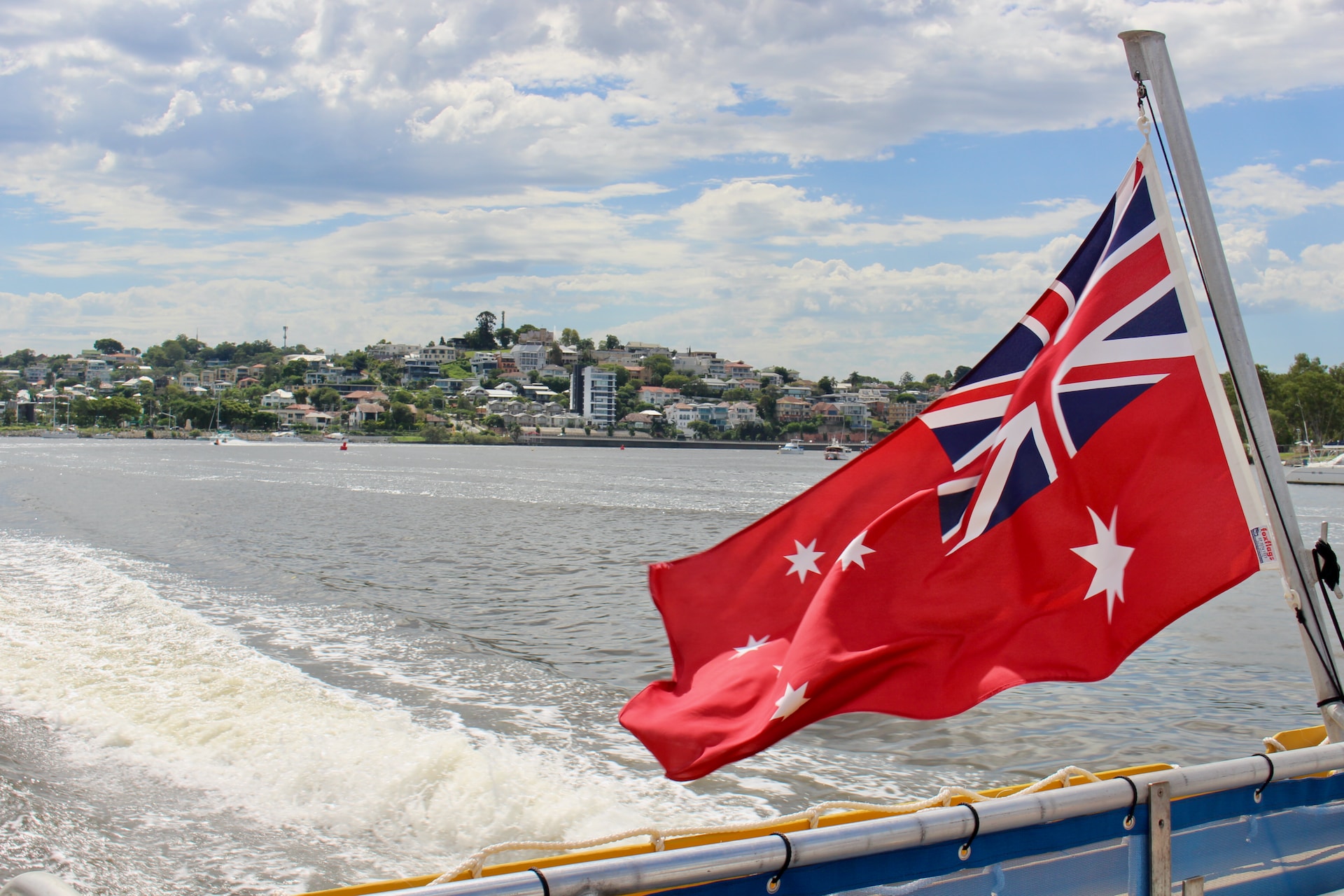The Australian flag flying from the stern of a boat