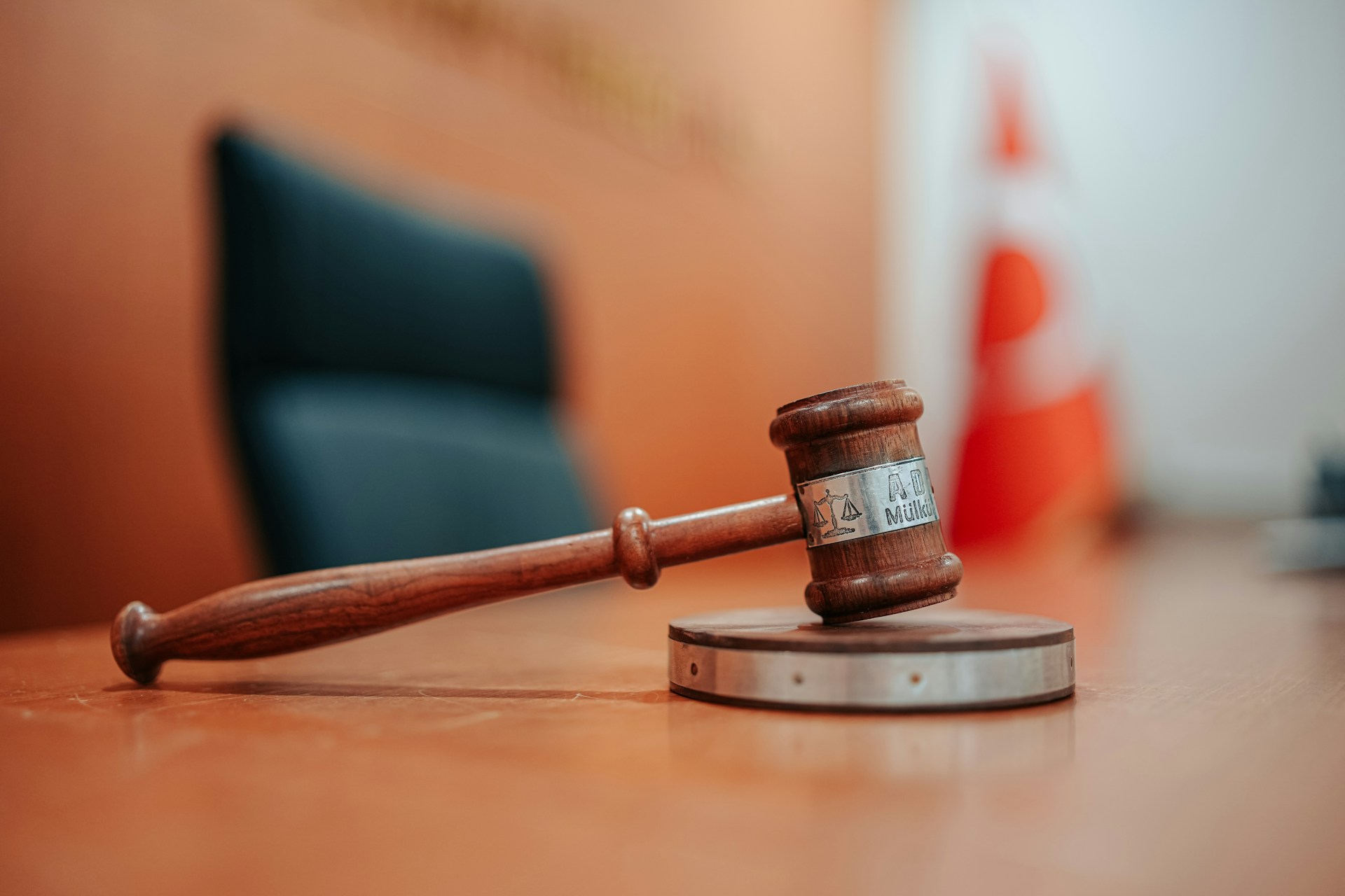 A judge's gavel in a courtroom