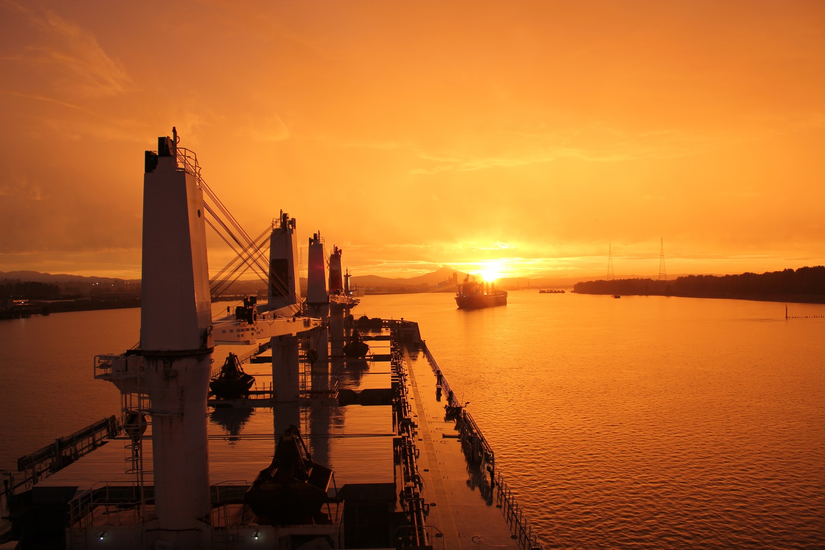 Bulk carrier at sunset seen from the bridge