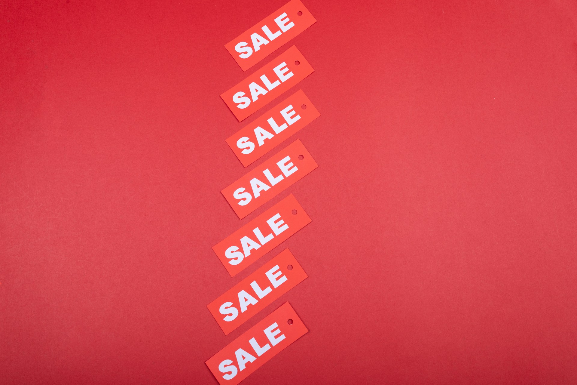 Red and white sale signs