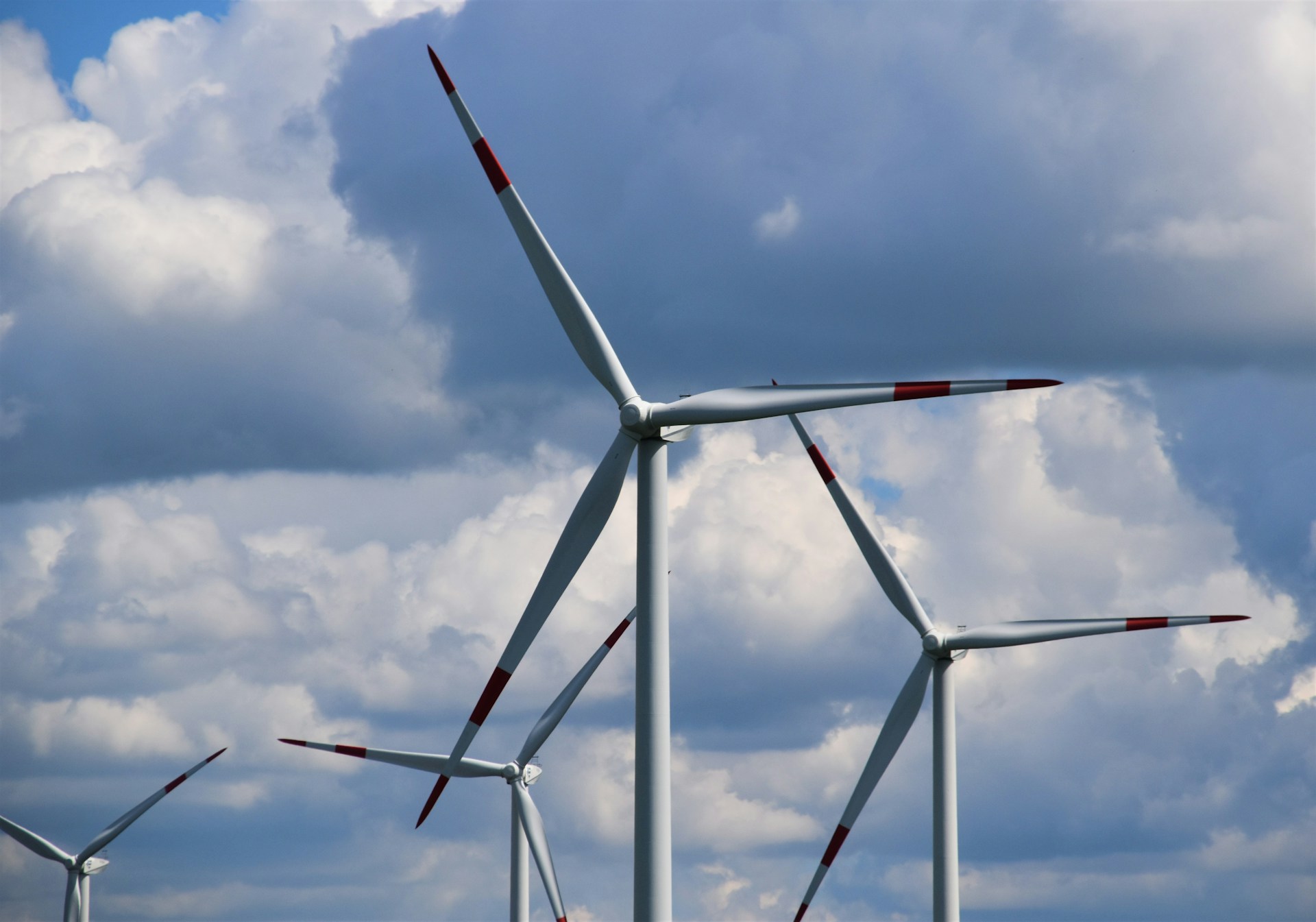 Wind turbines against clouds