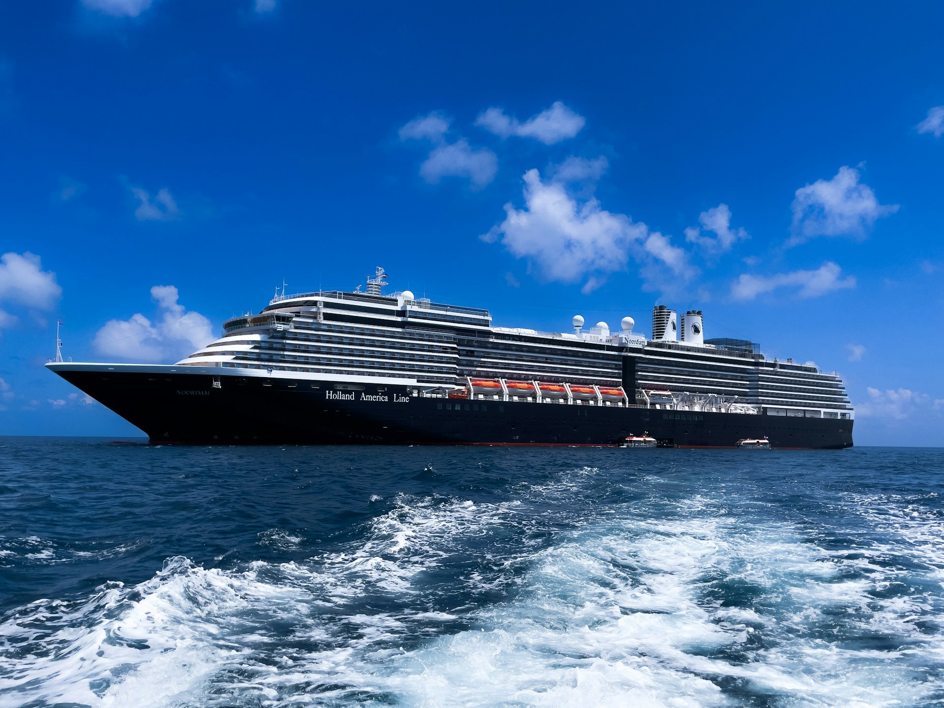 A Holland America Line cruise ship at sea