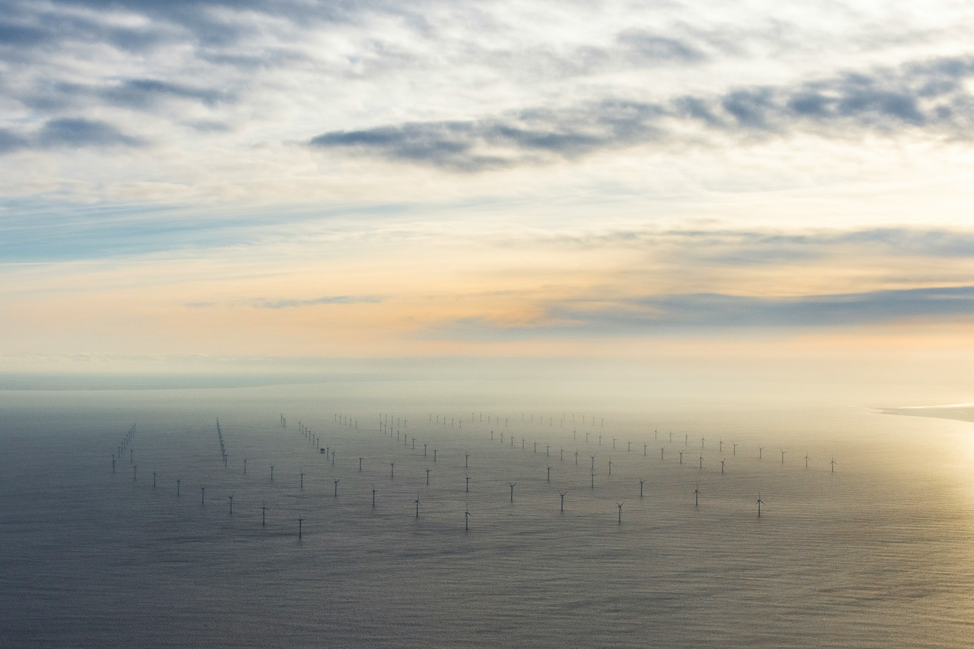 An offshore wind farm at sunrise