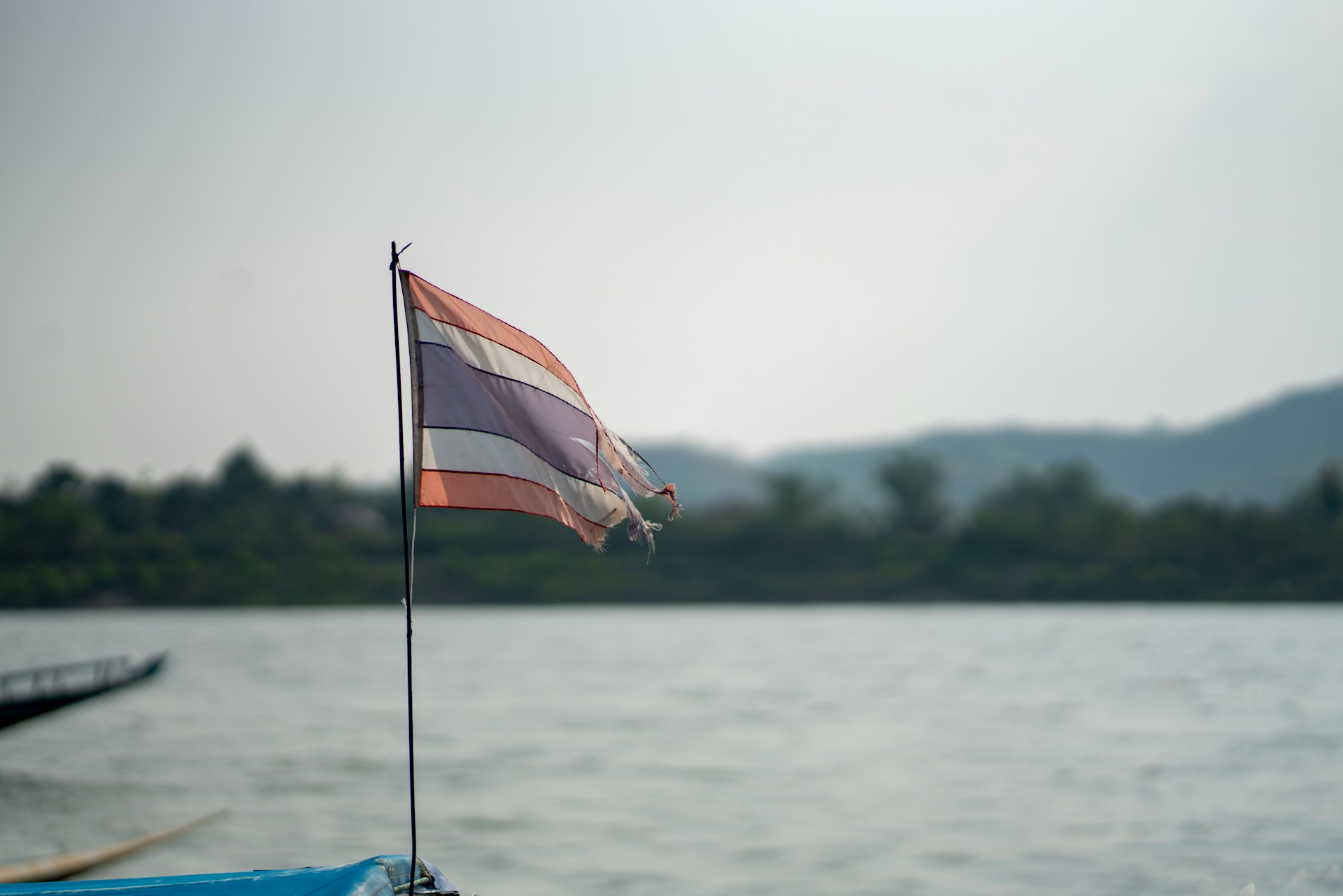 Thai flag on the back of a boat