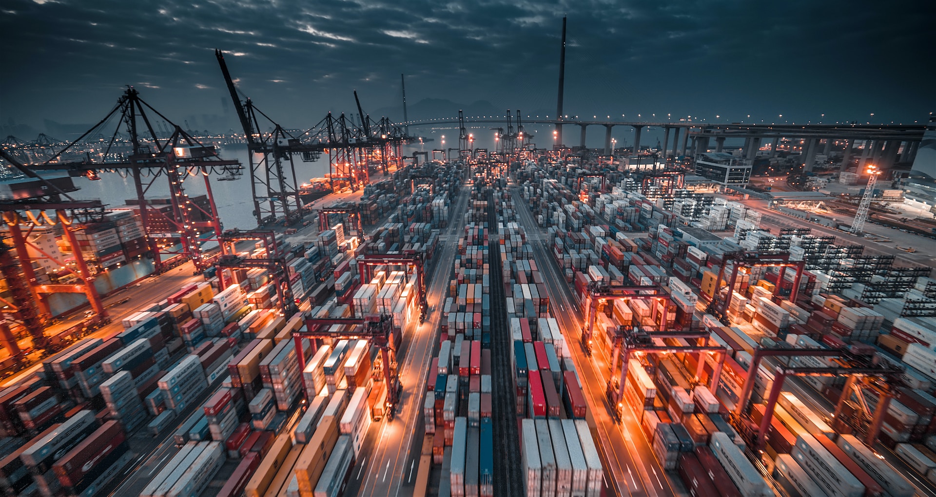 Busy container port at night