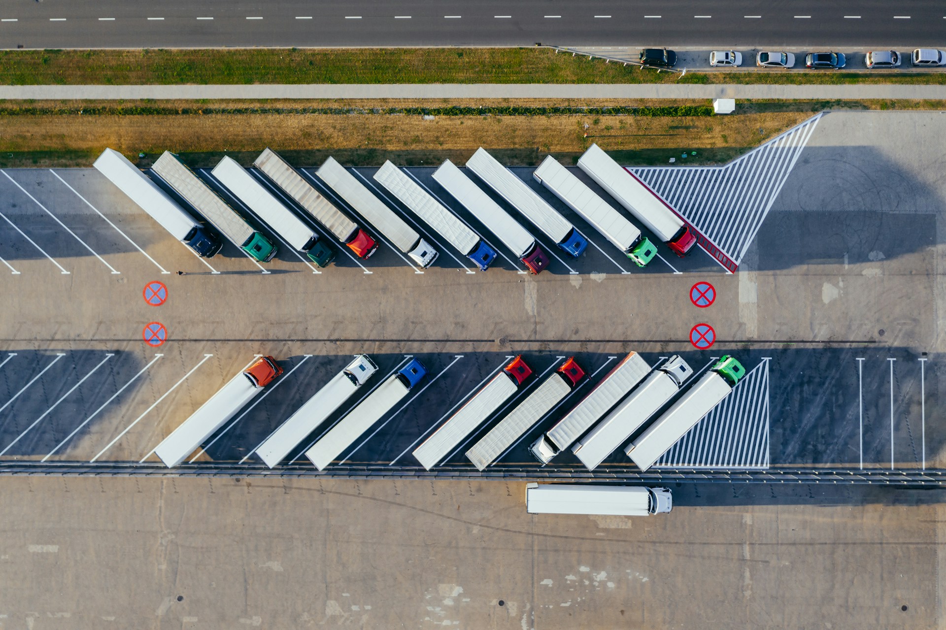 An aerial view of parked lorries