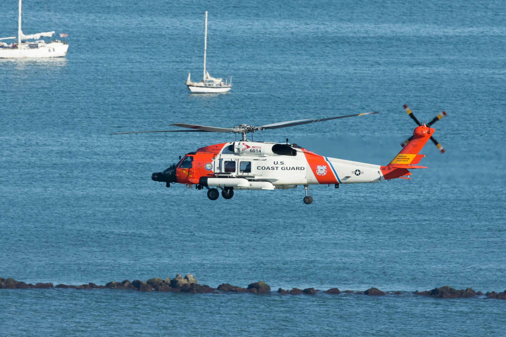 A US Coast Guard helicopter at sea