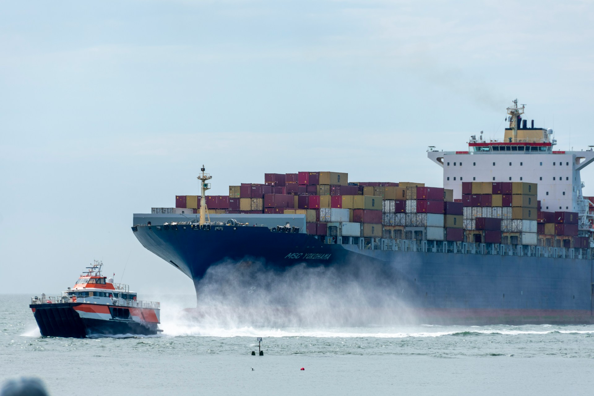 The MSC Yokohama and a tugboat