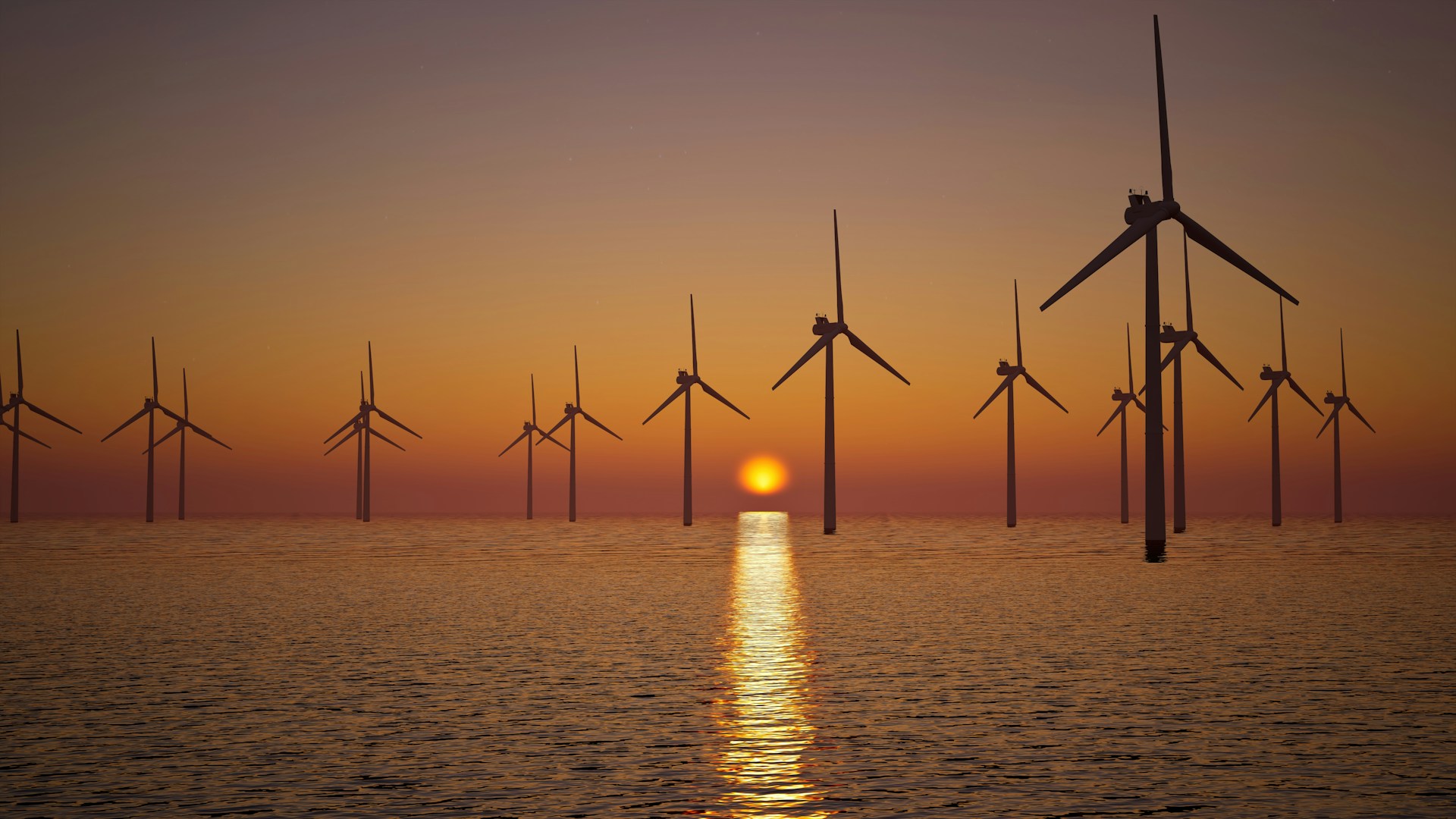 An offshore wind farm at sunset