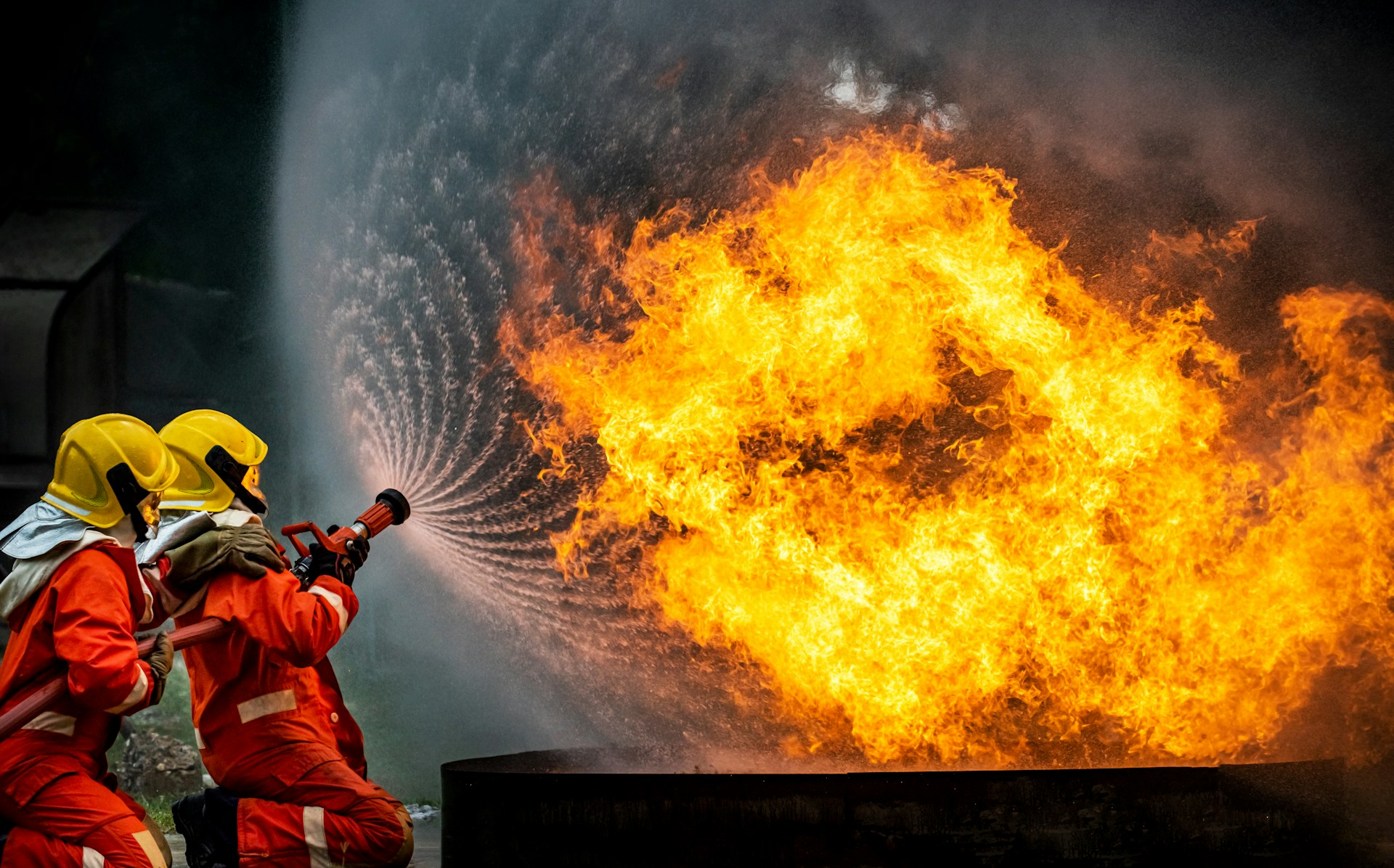 Firefighters trying to extinguish a fire