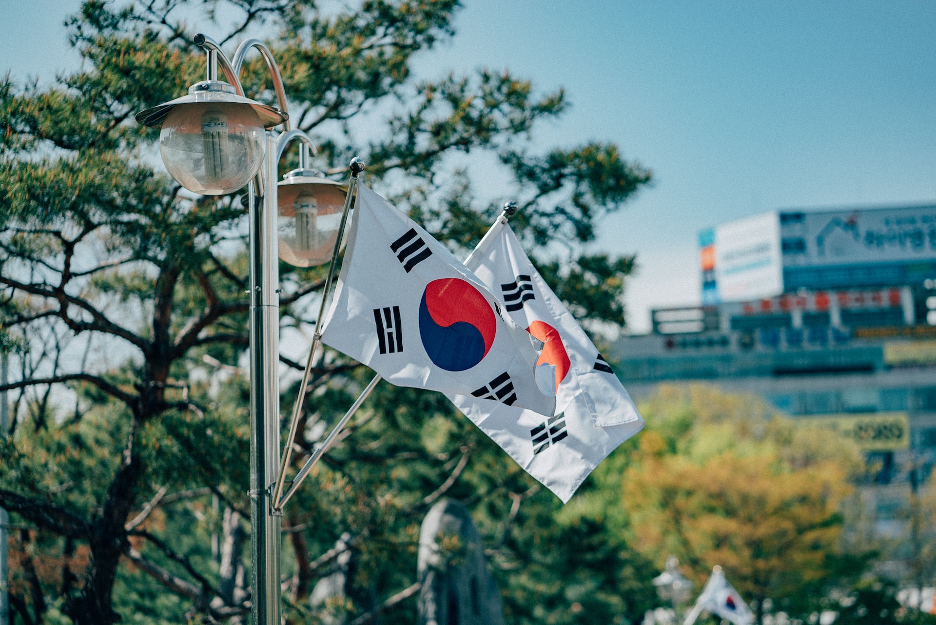 The South Korean flag flying in front of office buildings