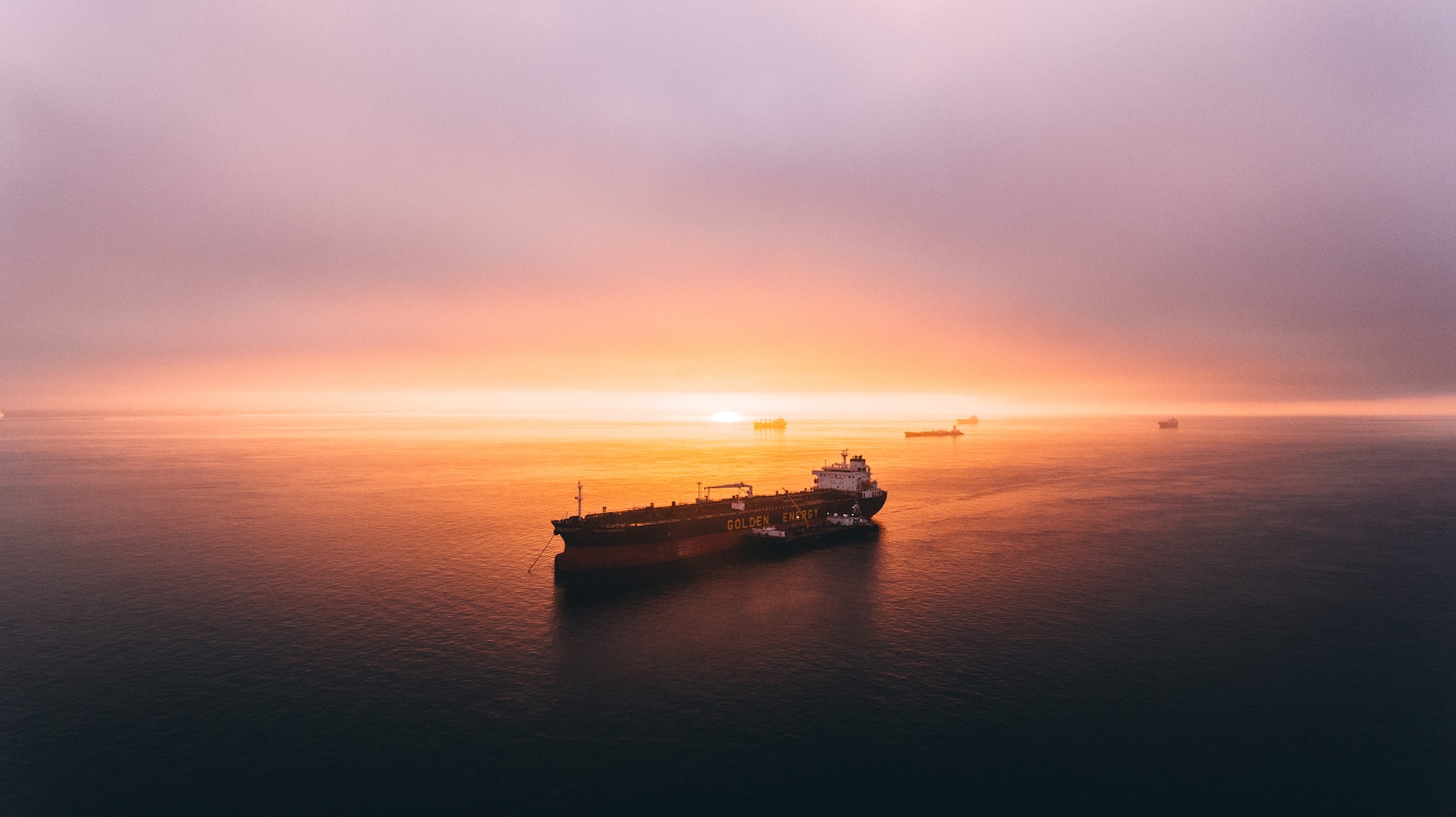 Tanker vessel at sunset