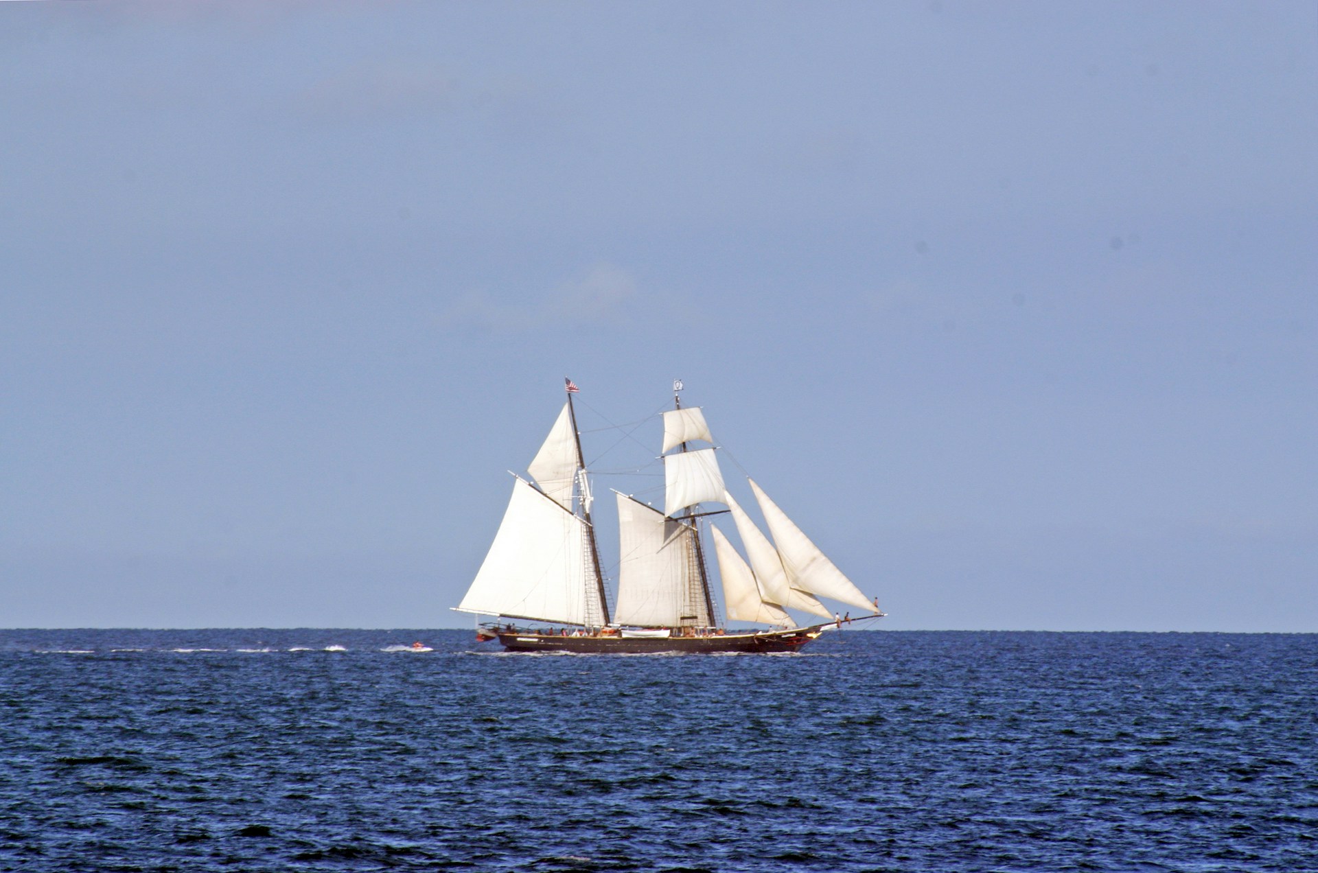 A sailing ship at sea