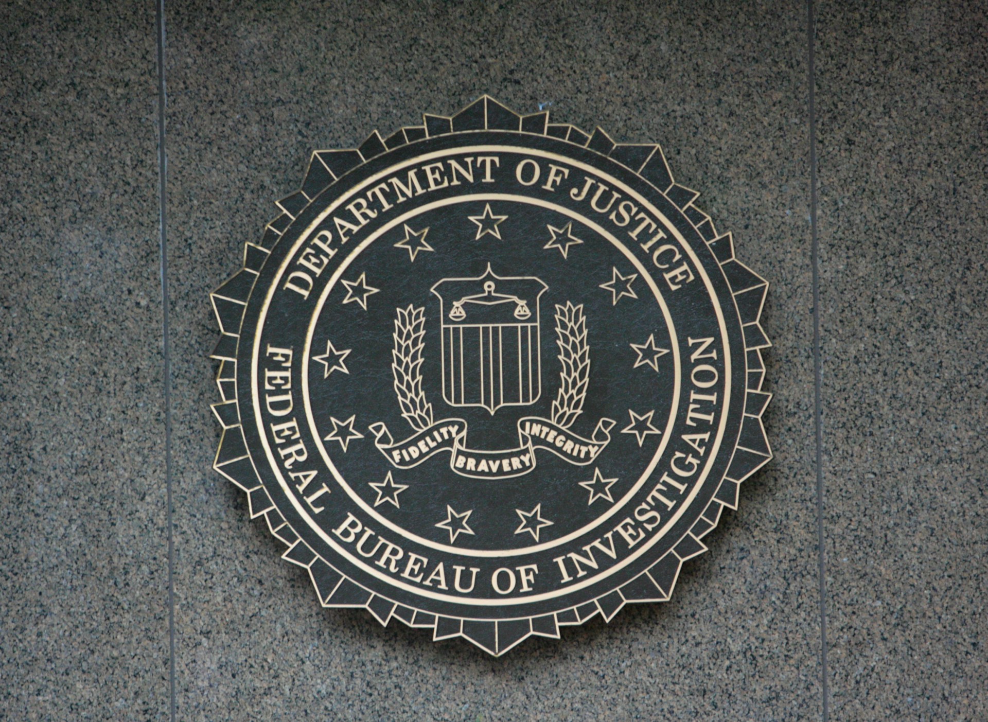 The FBI logo on a wall plaque
