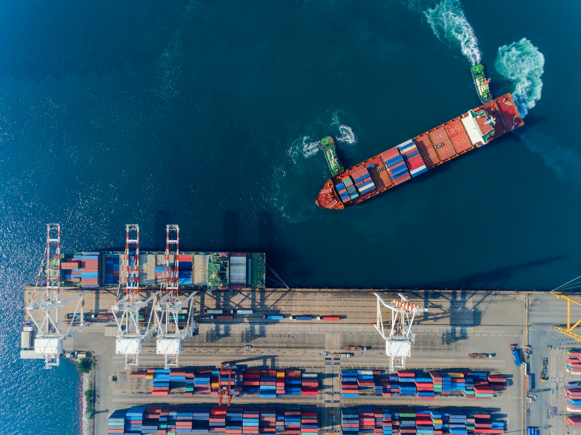 A container ship heading towards the dock