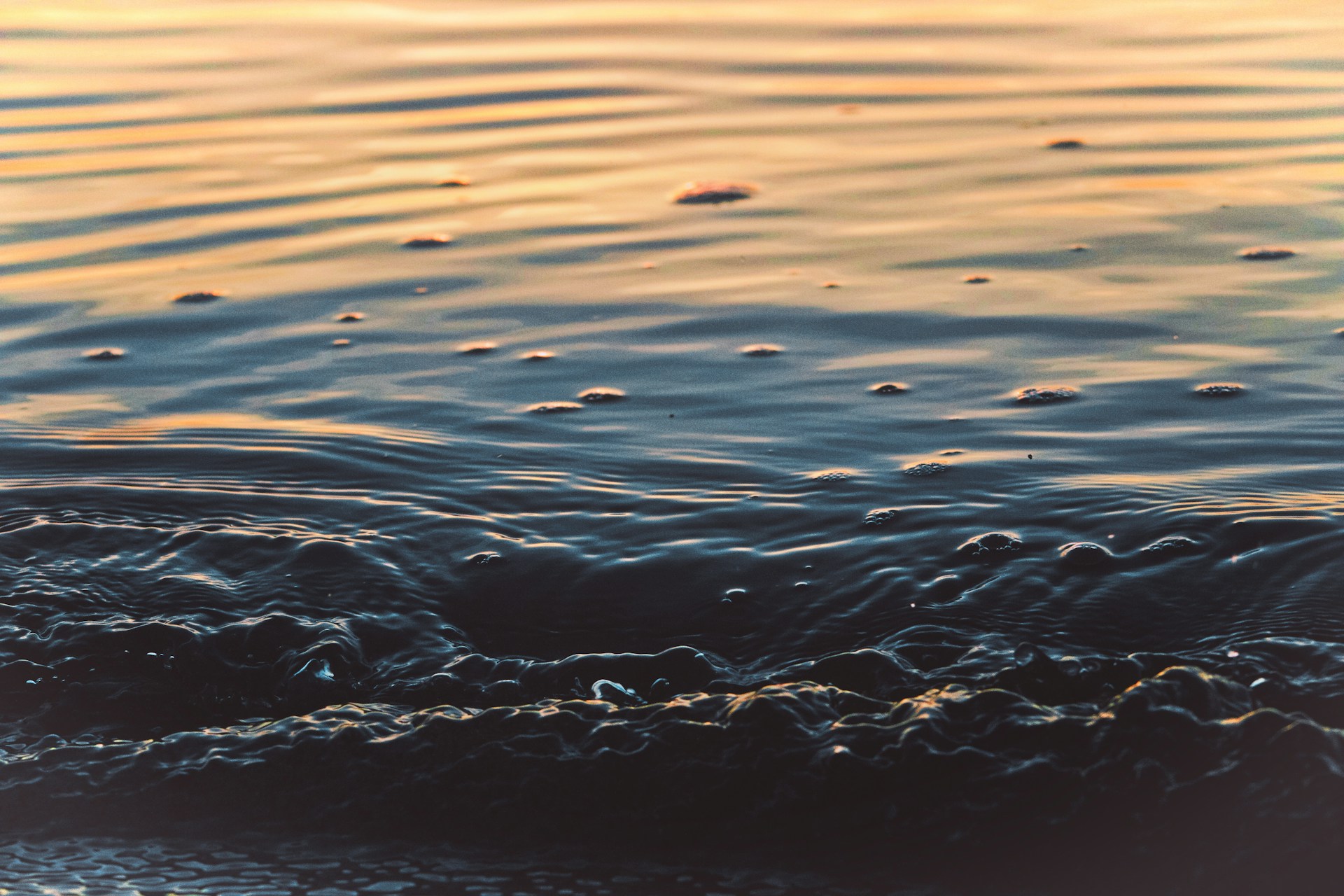 Close up of an oil slick at sea