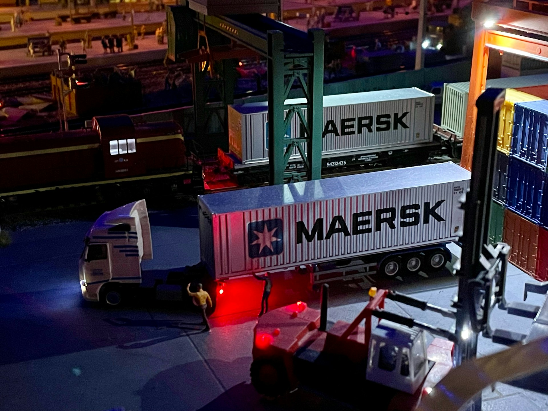 Maersk container trucks in a depot