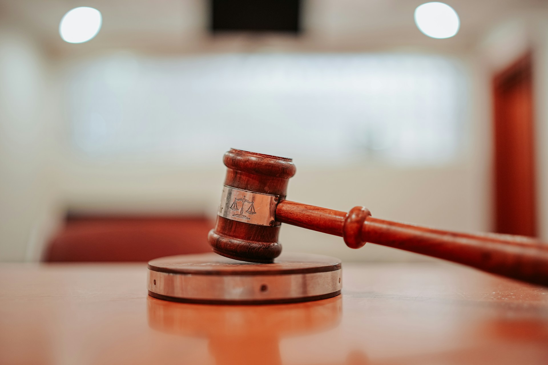 A judge's gavel in a courtroom