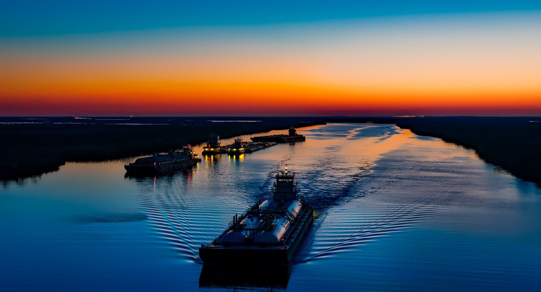 an oil tanker at sunset